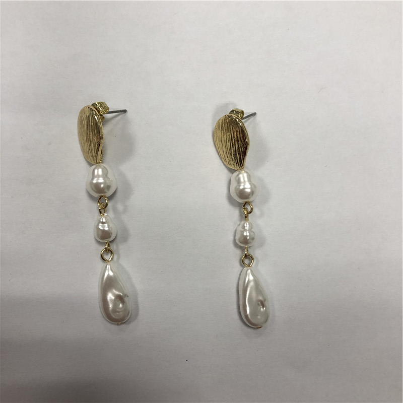 Occidental shell earring