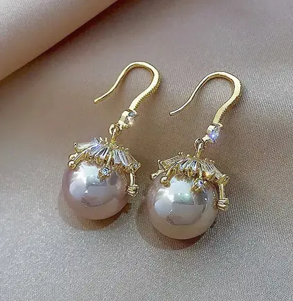 Glue the pearl earrings